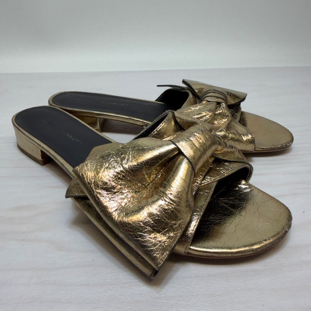 Rebecca Minkoff Women's Flat Sandals Size 8M Metallic Gold Bow Slip On Open Toe